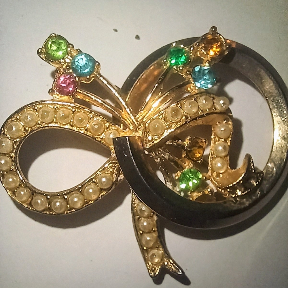 Gold and Silver Infinity Brooch with Rhinestone Accents
